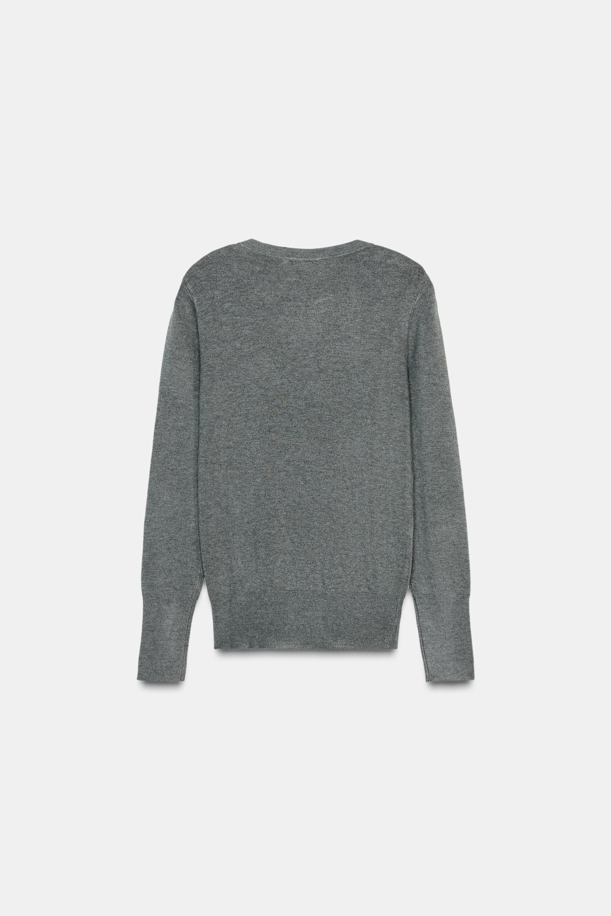 PULL EN MAILLE À BOUTONS